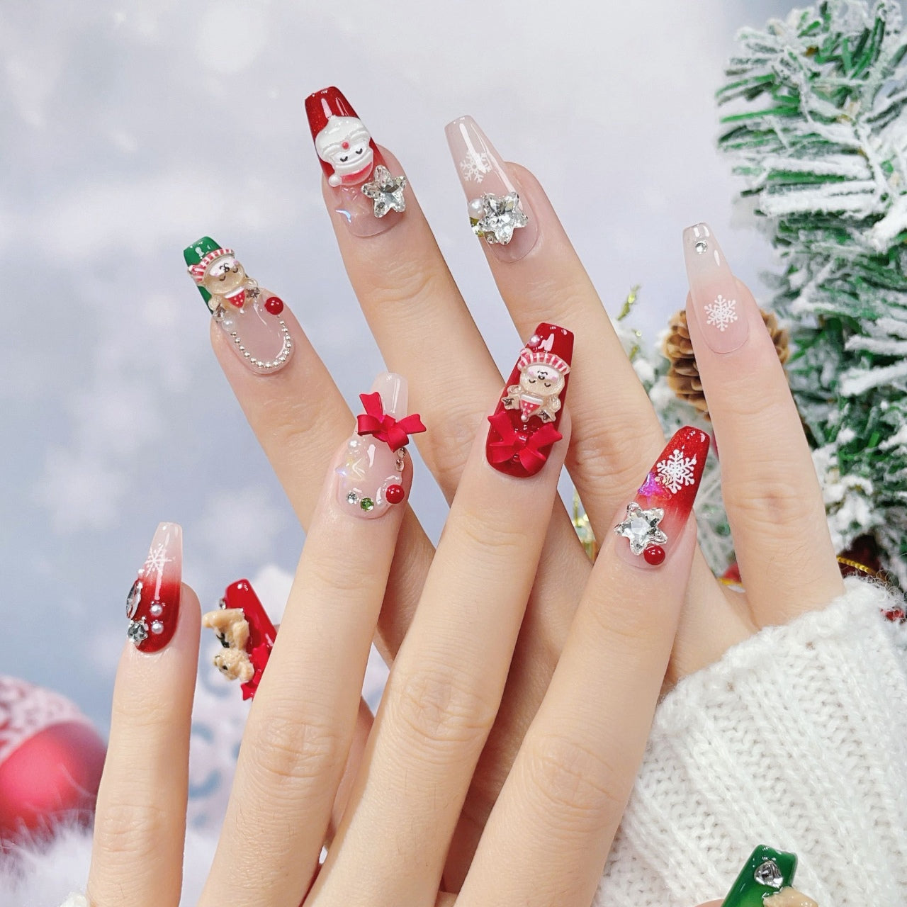 Festive Christmas-themed nails featuring detailed 3D designs, including Santa Claus, bows, snowflakes, and holiday ornaments, in red, white, and silver colors, creating a joyful and celebratory look.